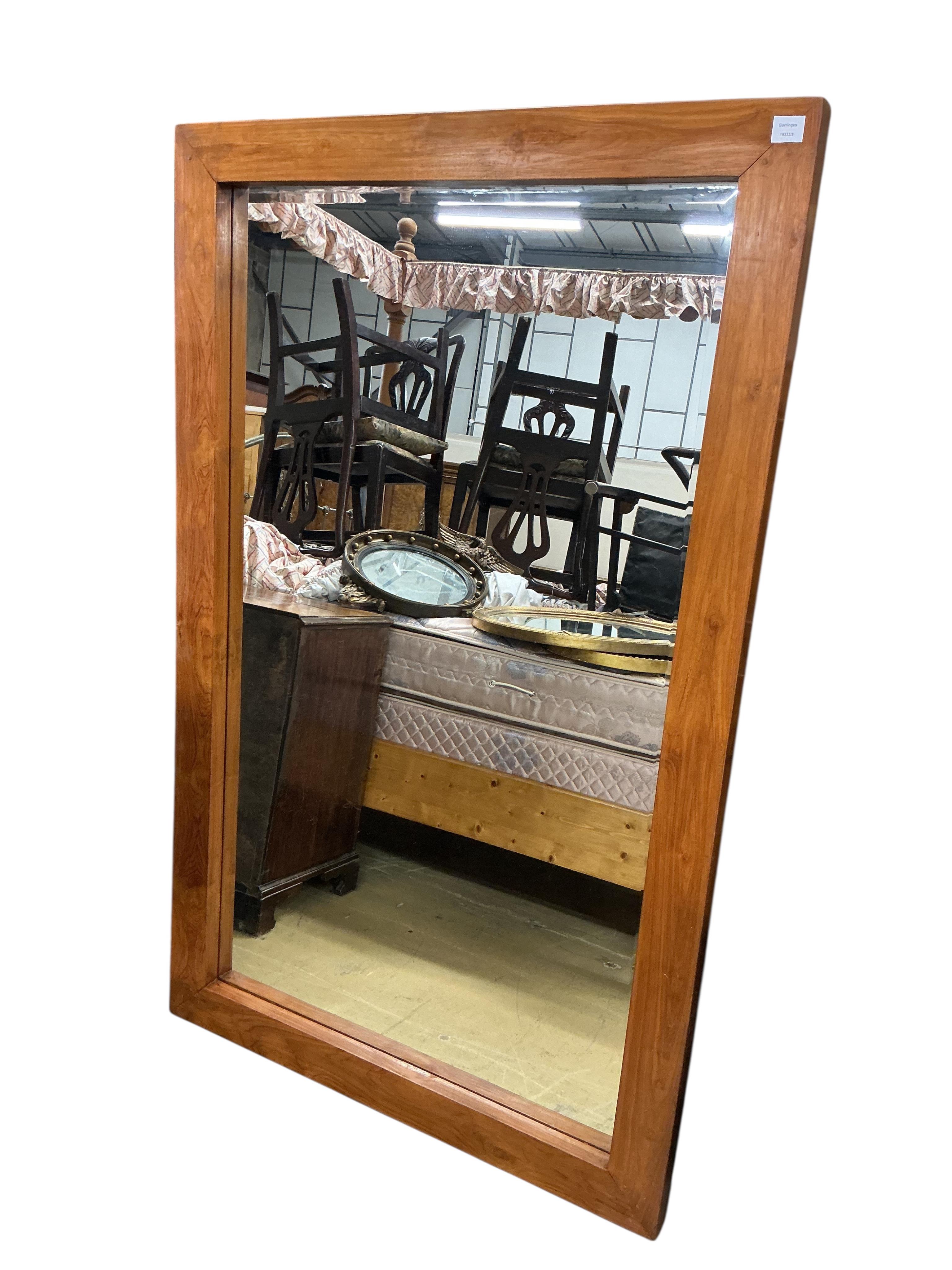 A large rectangular Contemporary oak framed wall mirror, width 110cm, height 126cm